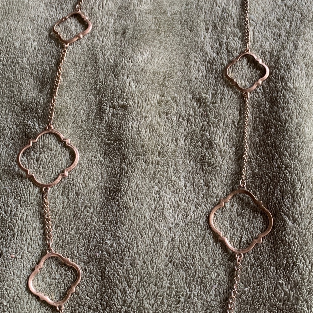 Long gold tone necklace